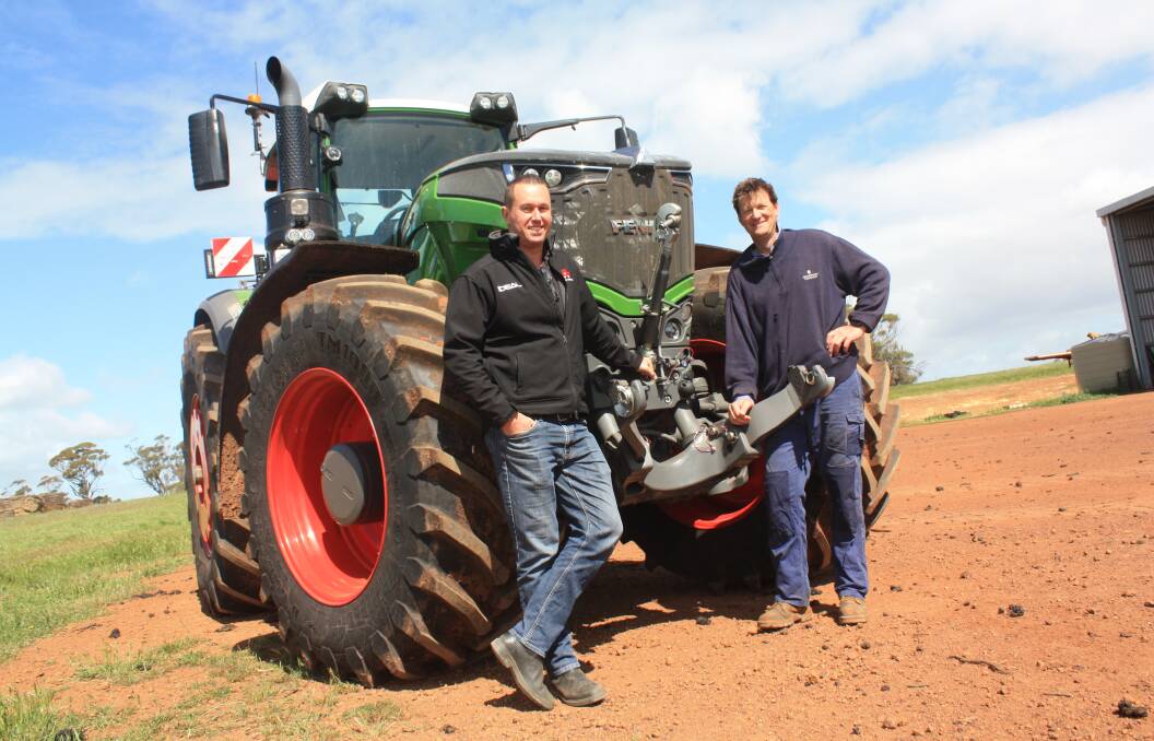 AgWest Machinery Geraldton branch manager Kent Douglas (left) and Cranmore Park owner Kristin Lefroy discuss the features of Mr Lefroy's new Fendt 1050, which will soon be pressed into action pulling a large square baler.