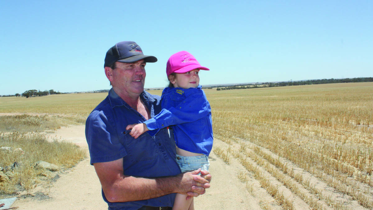 Tammin farmer Brad Jones and his daughter Nina (5) new technology is setting up new farming systems for future generations.