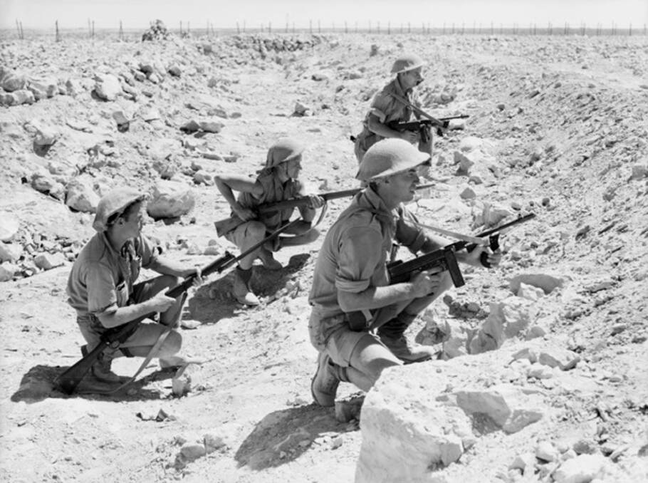 While defending the Tobruk port, Australian troops, who German propaganda labelled The Rats of Tobruk, went out on patrols of no-man's-land between the opposing forces. Here a patrol waits in an anti-tank ditch. Picture: Australian War Memorial.