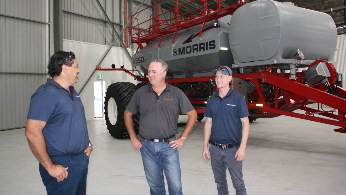 McIntosh Distribution's Max Herbert (national product support), left, talks with Morris sales manager WA Eliot Jones and McIntosh Distribution's Dylan Trindall (WA product support) before the start of last week's Morris training day at Wongan Hills.