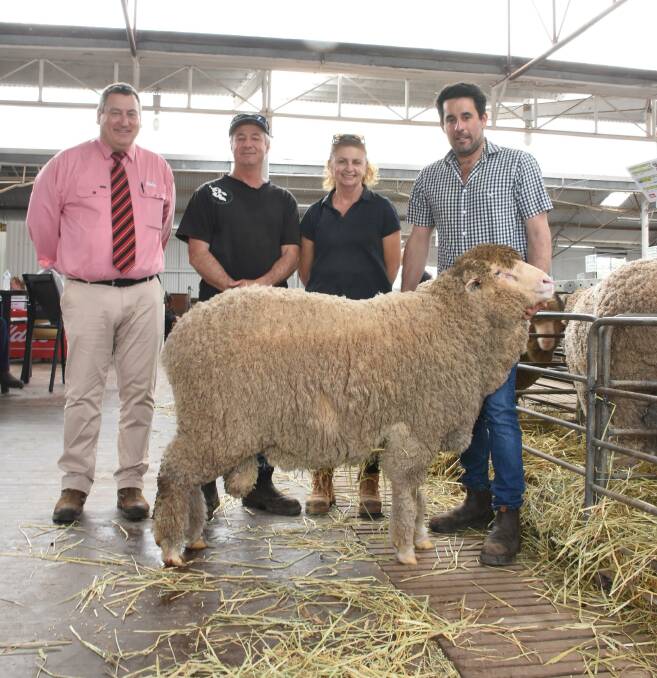 This ram sold for the $4400 second top price at the Woolkabin on-property ram sale at Woodanilling last week. With the ram were Elders stud stock manager Tim Spicer (left), buyers John and Deb Young, John Young & Co, Poondarra stud, Kondinin and Woolkabins Ben Patterson.