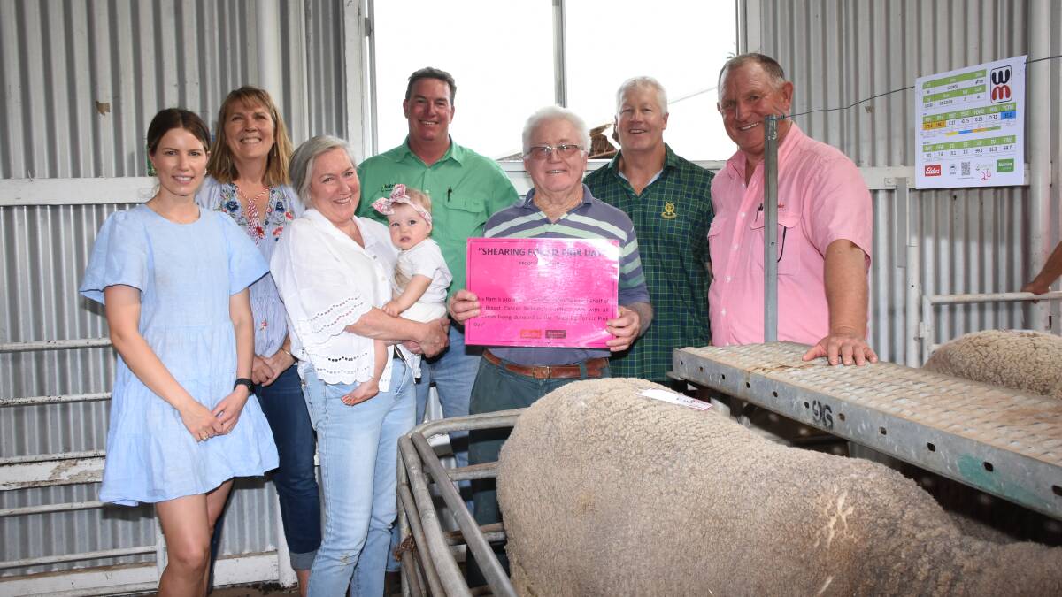 In the sale the Patterson family donated the proceeds of one of their Poll Merino rams to the Shearing For Liz Pink Day fundraiser charity for Breast Cancer Research - WA and it sold for $1500. With the ram were Catherine (left), Carol and Sue Patterson holding granddaughter Matilda, Nutrien Livestock, Katanning agent Mark Warren, buyers Bruce and Darren Howatson, Newdegate and Elders stud stock representative and Katanning agent Russell McKay.