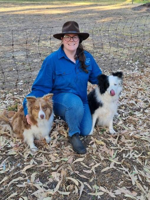 Murdoch University postdoctoral student Emily Taylor at home in the Perth Hllls with her dogs Blair and Blue