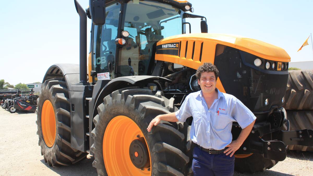 Boekeman Machinery Northam salesman Sam Moss said the rise in popularity of JCB Fastracs was "almost inevitable given what they offer for year-round work". He's pictured next to the latest 8330 model.