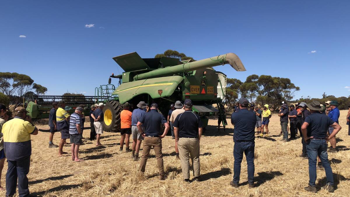 Growers in WA's northern agricultural region pictured viewing a demonstration of the new vertical, mechanical Integrated Harrington Seed Destructor (iHSD) on a property near Carnamah last month.