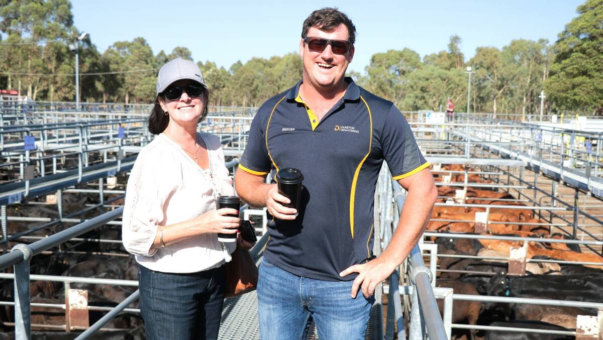 Denise and Brayden Dewar, Roelands, checked the yarding at the Boyanup weaner sale.