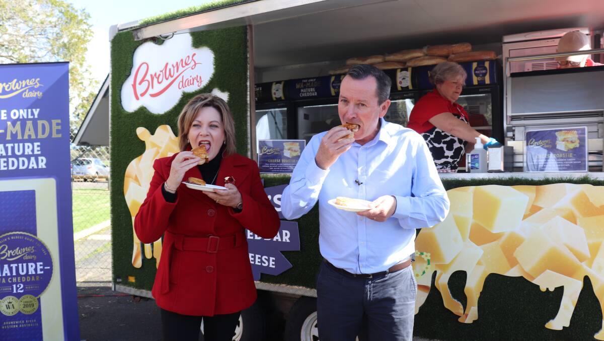 Murray-Wellington MLA Robyn Clarke and WA Premier Mark McGowan tuck into toasties made with Brownes Dairy's vintage and mature cheddar cheese at the product launch.