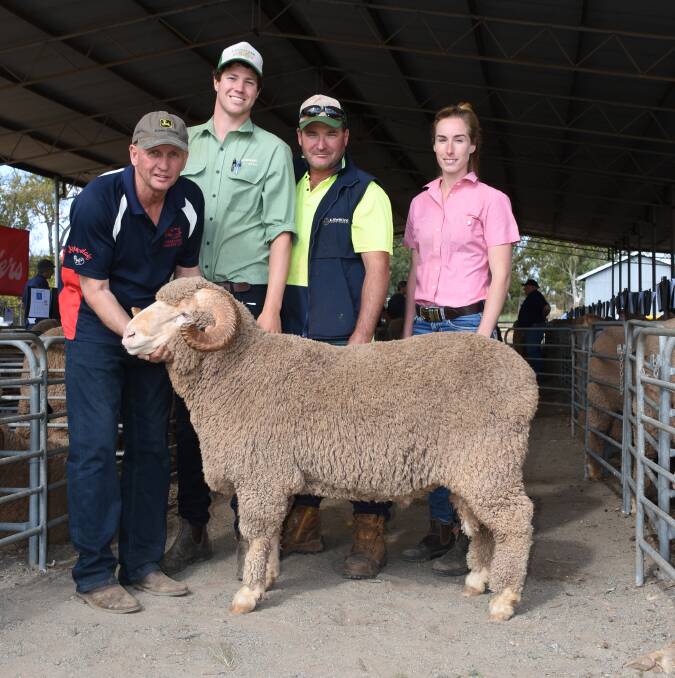 Prices peaked at $3600 at last week's Sutherlands ram sale at Carnamah for this Arra-dale Poll Merino sire purchased by Whybrow Farm Trust, Badgingarra. With the ram were Arra-dale co-principal Les Sutherland and son Lachlan, Elders stud stock representative Don Morgan, Landmark auctioneer Michael Altus and Casey Whybrow.