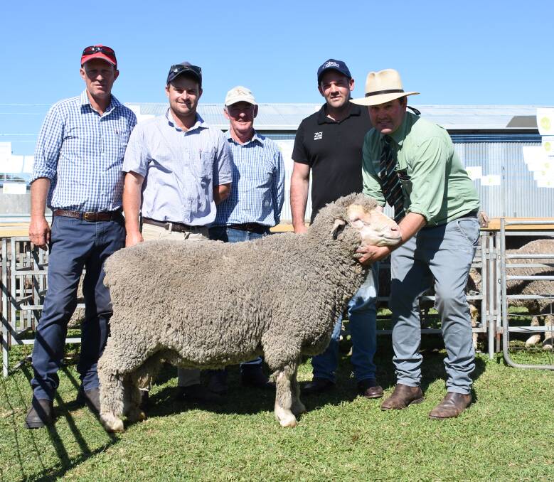 With the Moojepin sire which sold privately for a stud record price of $25,000 before last week's Moojepin Merinos on-property sale at Katanning were Moojepin co-principal David (left) and Hamish Thompson, buyers Robert and Will Hooke, Willera Merinos, Serpentine, Victoria and Landmark Breeding representative Mitchell Crosby.