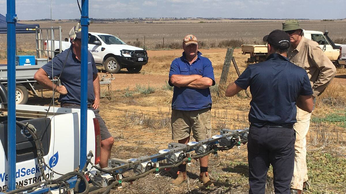 Northern Wheatbelt growers pictured discussing the workings of the new WeedSeeker 2 spot-spraying system from Trimble during an on-farm demonstration.