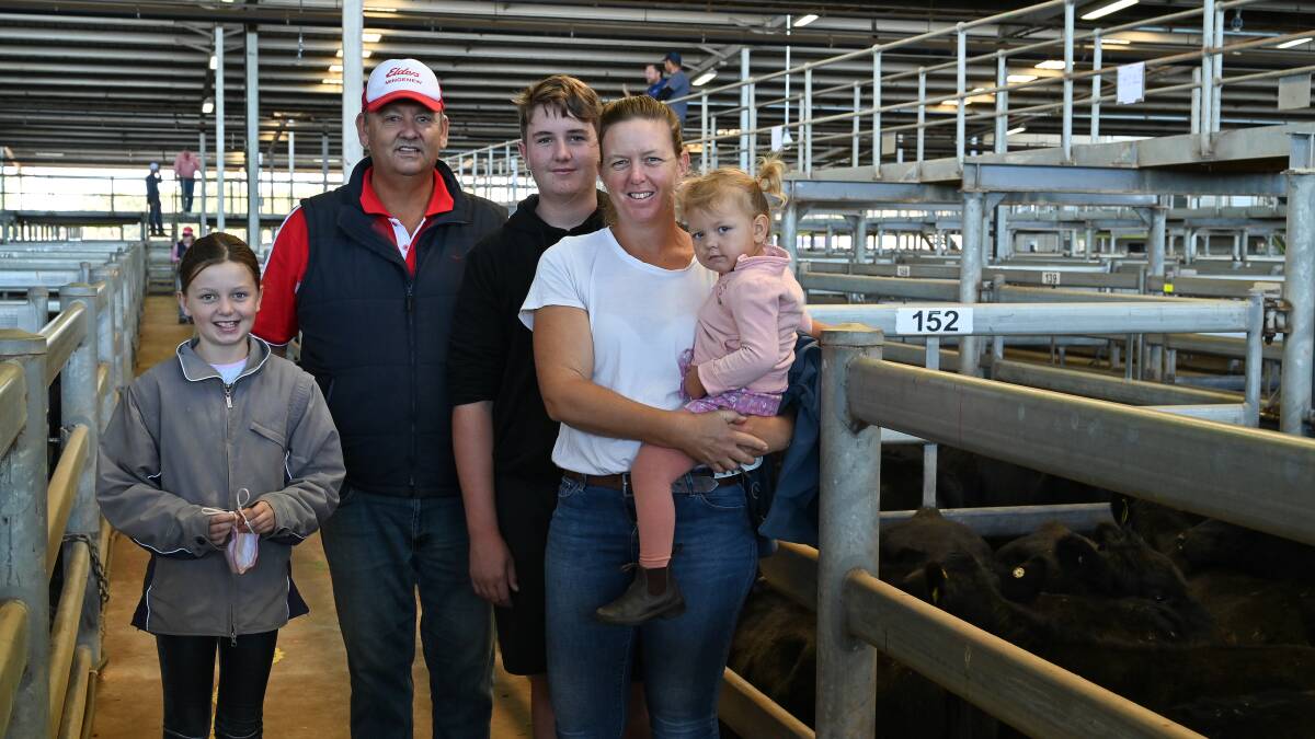  Viewing some quality drafts of cattle before the auction was Elders, Mingenew agent Ross Tyndale-Powell with his family Lahni (left) and Jake Godenzie and Jodie and Georgie Tyndale-Powell.