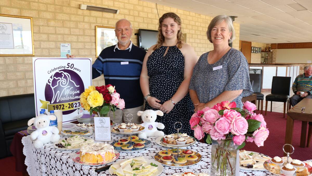 Wagin Woolorama committee president Paul Powell, secretary Amelia Thornton (centre) and vice president Fiona Dawson with part of the high tea spread put on by the committee for the special occasion.