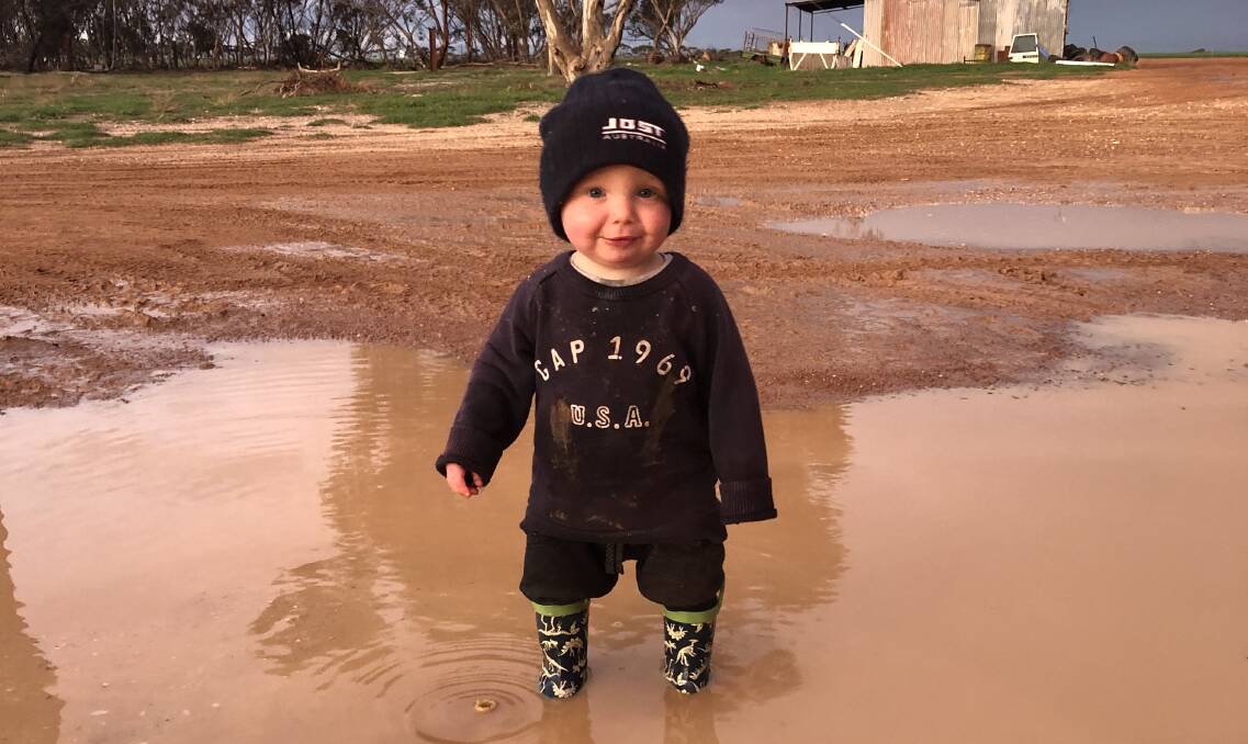 Ned Norwood, 14 months, loved the puddles at his grandparent's property at Scaddan, after 63mm of rain fell over the weekend. Photo by Kell Norwood.