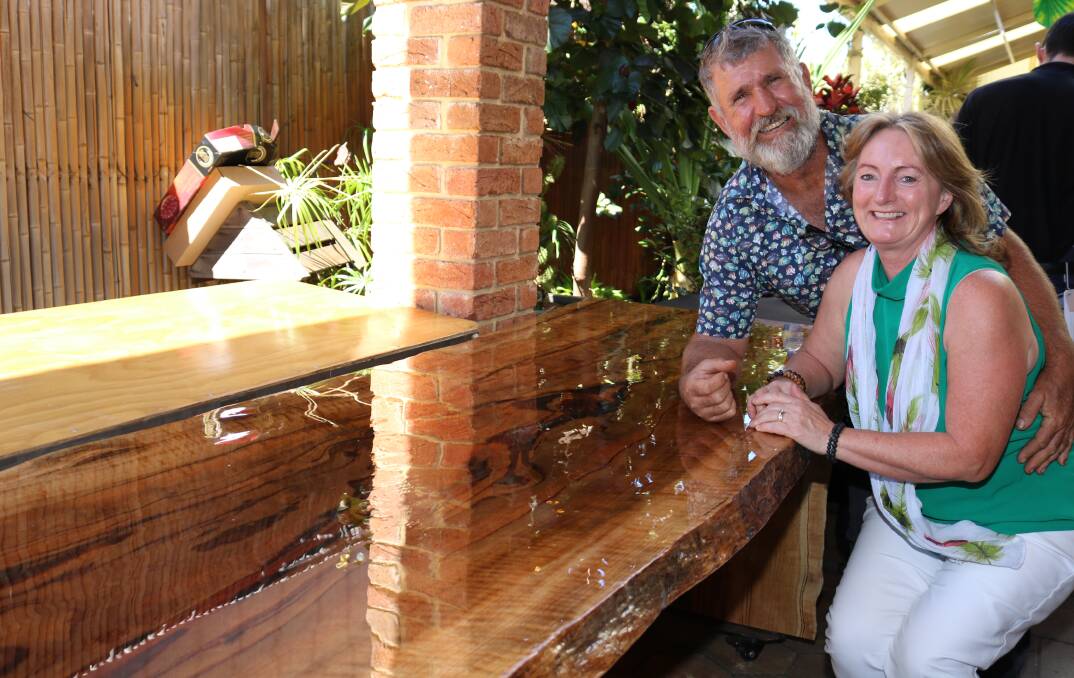 p Dowsing Group co-principals Carl and Jacinta Dowsing donated this magnificent marri table cut from a tree on their Bakers Hill farm. The table was bought by Kukerin farmers Michael and Mary Nenke.