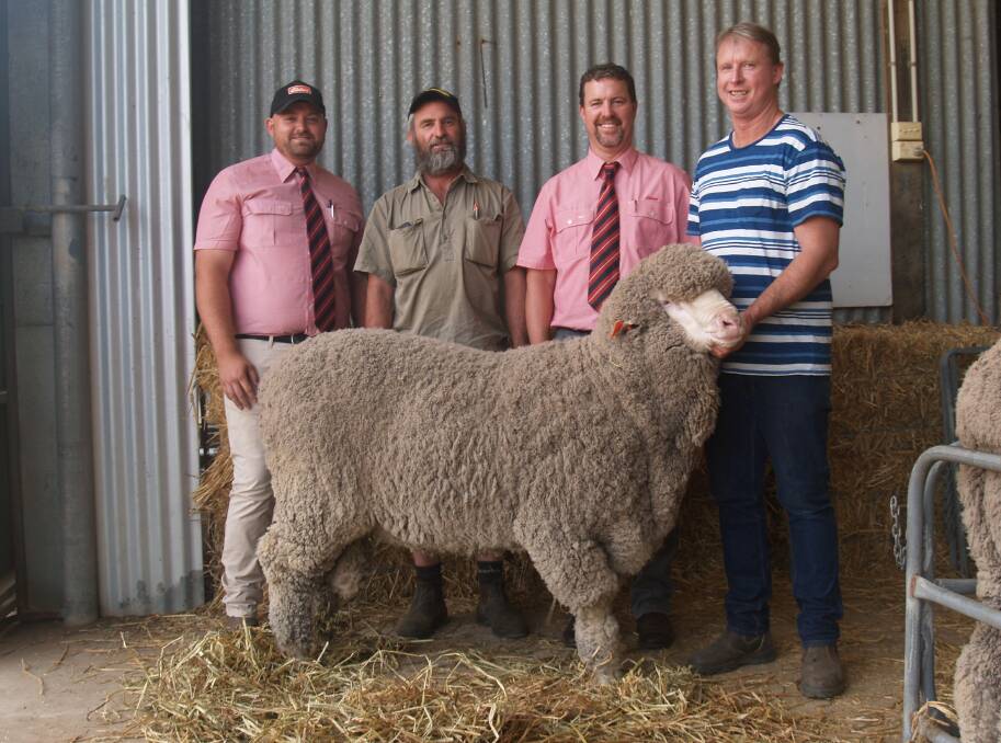 With the Poll Merino ram which topped the East Mundalla on-property ram sale at Tarin Rock last week at $15,750 when it was knocked down to the Canowie Fields stud, Gairdner were Elders Lake Grace representative Simon Sangalli (left), buyer Jason Griffiths, Canowie Fields stud, Elders auctioneer Nathan King and East Mundalla co-principal Daniel Gooding.