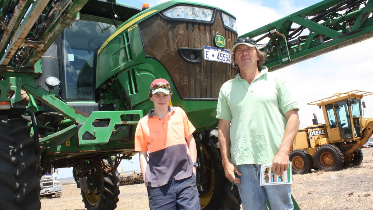 West Cranbrook farmer Fred Smith (right), pictured with his son MacKenzie, admitted he made the four hour trip, "looking for a bargain". He didn't find one on this lot which featured a 2015 John Deere R4045 self-propelled boomsprayer equipped with RTK guidance, a 4500 litre tank and a 30 metre boom. With only 2230 engine hours it failed to meet the reserve price and was passed-in on a final bid of $175,000.
