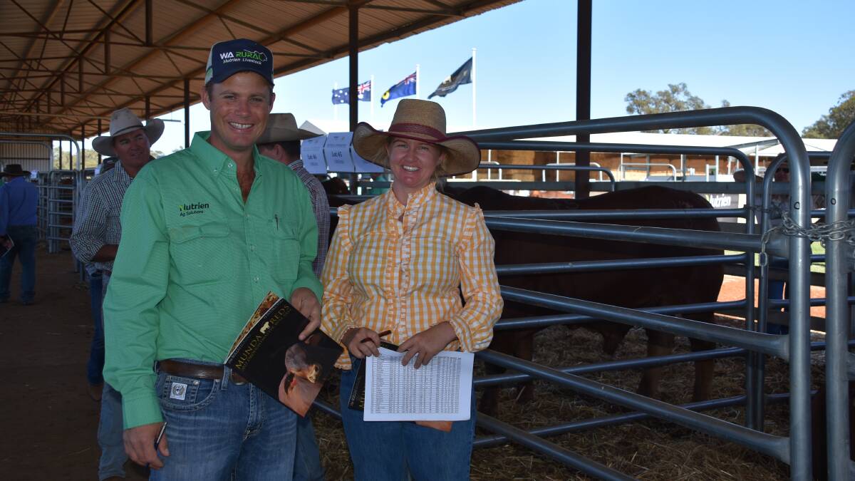 Looking over the line-up of bulls before last week's Munda Reds on-property bull sale at Gingin were Nutrien Livestock Pilbara and Gascoyne agent Shane Flemming (left) and Cass Parker, Yanery station, Onslow. During the sale Yanrey station purchased five bulls (one stud and four commercial) to a top of $8000 and an average of $7100.