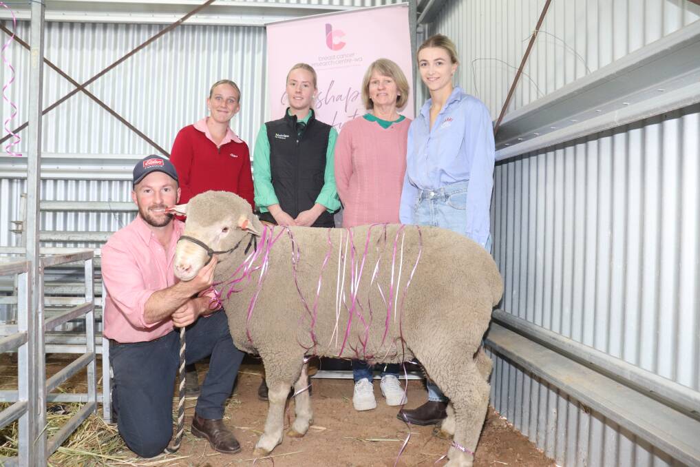  WIth the pen 100 ram, selling for $2000, offered by the Tiarri stud on behalf of the Breast Cancer Research Centre WA, with all its proceeds being donated to the Shearing for Liz Pink Day, is
Elders auctioneer and Gnowangerup agent James Culleton (left), Elders Lake Grace rural sales representative Georgia Mills, Nutrien Livestock trainee Maddie Goerling, breast cancer ram buyer Jane Campbell, South Borden, and Mia Gooch, of the Tiarri Prime SAMM stud.