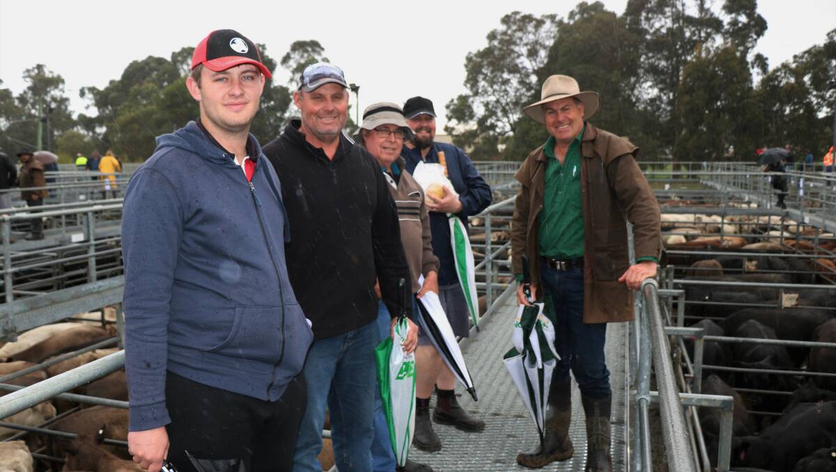 The Ashmore family, TW & RM Ashmore, Narembeen, offered more than 300 head of cattle at the Nutrien Livestock store cattle sale at Boyanup with their Murray Grey steers selling to $2286 and Murray Grey heifers to $1910 Cory (left), Colin, Terry and Grant Ashmore caught up with their livestock agent Richard Pollock, Nutrien Livestock, Waroona.