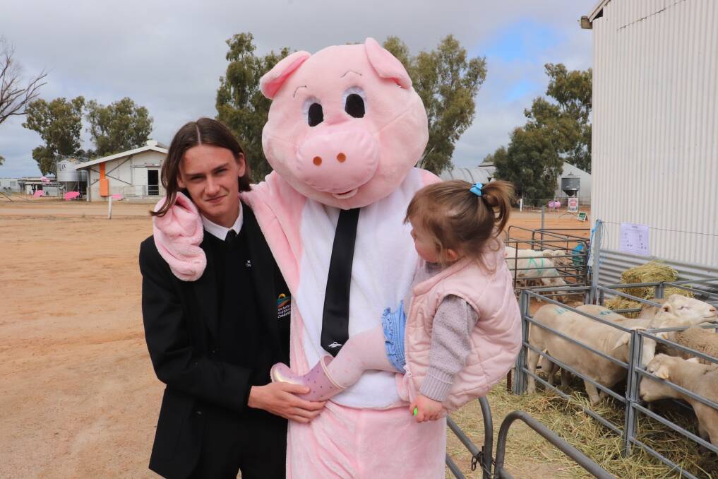 Year 12 students Campbell Gors and Jake Pickering with Lucy (2).