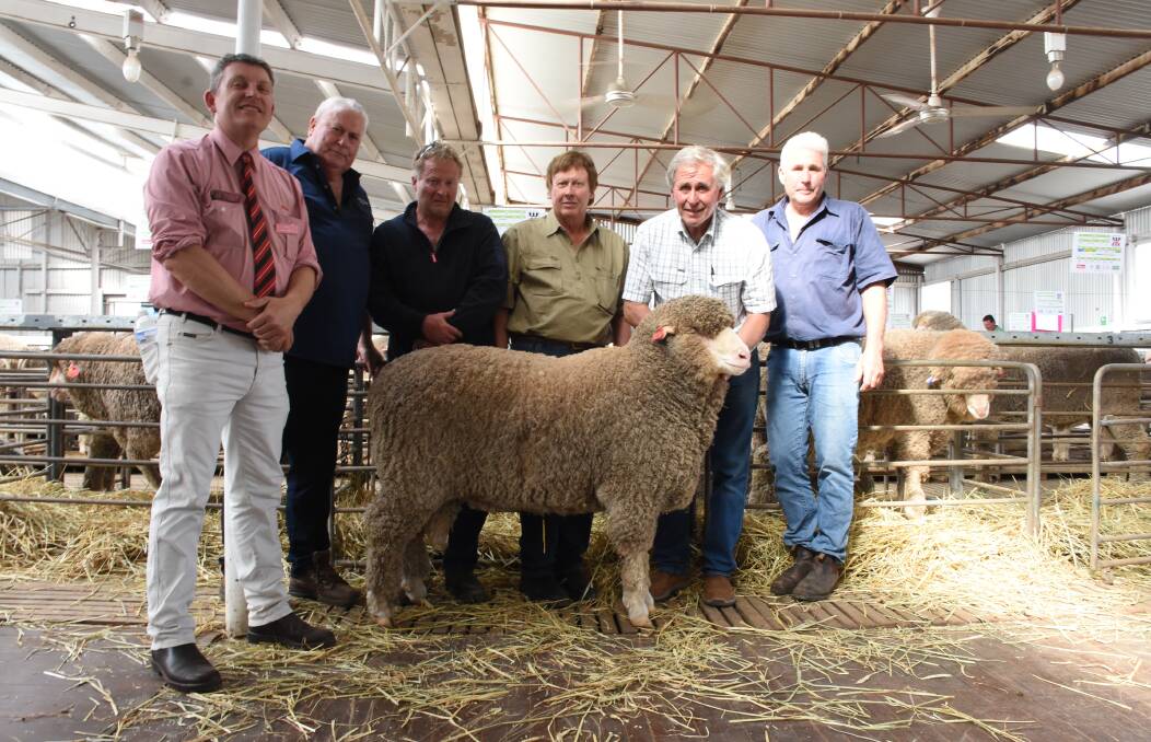 With the $5000 top-priced ram at last weeks Woolkabin Merino and Poll Merino on-property ram sale at Woodanilling were Elders, Katanning branch manager Keith Daddow (left), Woolkabin classer Kevin Broad, buyers Murray and Tom Lloyd, Darkan and Woolkabin principals Chris and Eric Patterson.