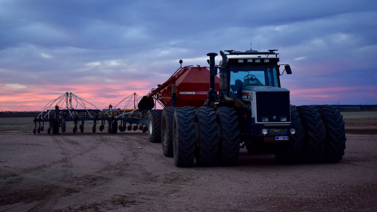  Candy coloured skies on Anzac Day with the seeder ready to get the program started the day after. Photo by Robyn Probert, Welbungin.