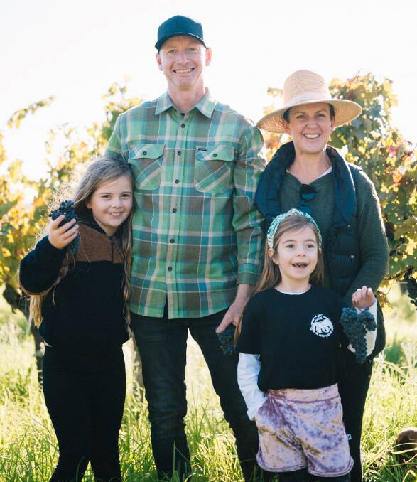  Little grape farmers Poppy (left), 8, and Georgia, 6, Baxter with their parents Scott and Annette.