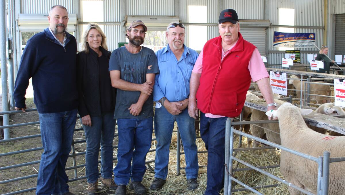 Wayne (left) and Robyn White, Blackwood White Suffolk stud, Dinninup, together with stockman Paul Newman relaxed after a successful sale last week were all 30 rams sold under the hammer to great average of $1032. With them were Westcoast Wool & Livestock representative Brenton Tynan and Elders Boyup Brook agent Peter Foster, who both bought a handful of rams on behalf of Blackwood clients.