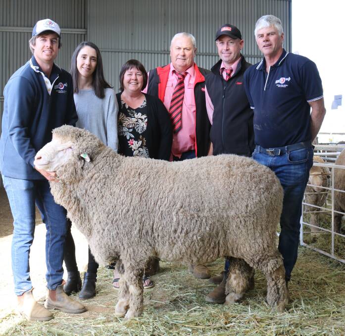 With the $4700 top-priced Eastville ram were stud principals Luke (left), Daniela and Shirley Ledwith, Dudinin, Elders Merino classer/consultant Kevin Broad, who bought the ram for Northwich stud, Wongan Hills, Elders area manager central Shane Medlen and Matthew Ledwith, Eastville.