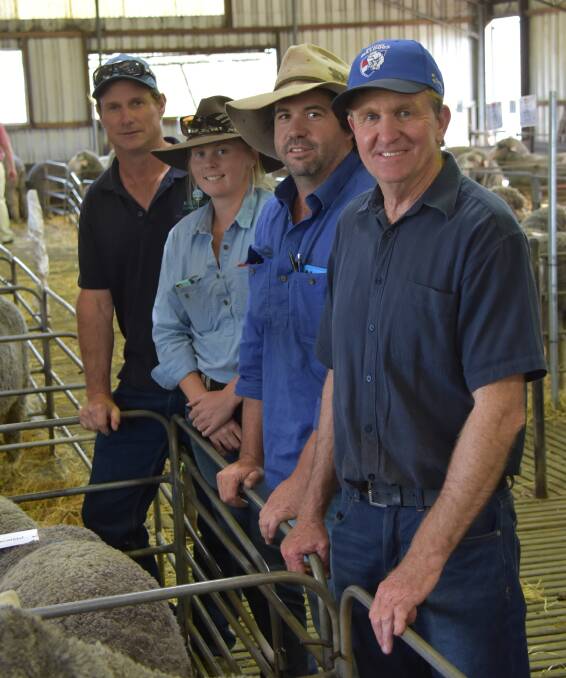 The volume buyer in the sale purchasing 20 rams was Power Grazing, Busselton. Looking over the rams purchased by the operation after the sale were Power Grazing's Brooke Kelly (left), D'arne Wilde and Craig Power and Westerdale principal Peter Jackson.