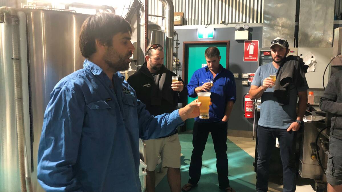 Nigel Metz (left), from Lucky Bay Brewing explains to York and Beverley farmers on the Nutrien Ag Solutions Esperance tour how the company sources grain direct from growers.
