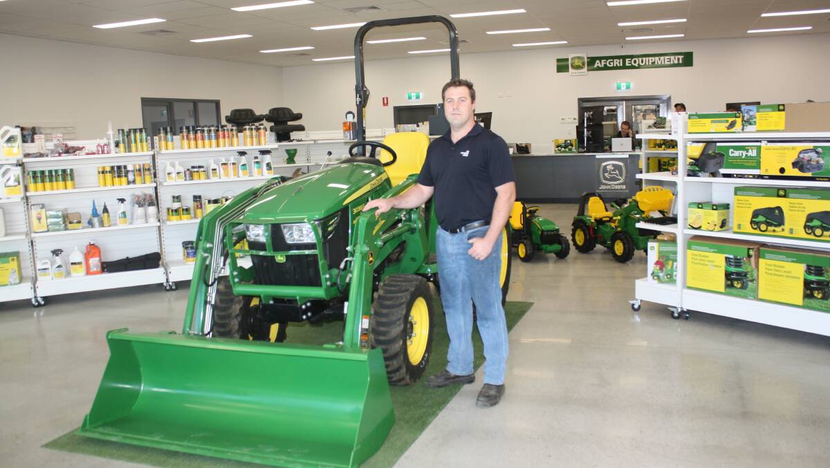 AFGRI Equipment customer sales representative Matt Holmberg at the front of the new expansive showroom.