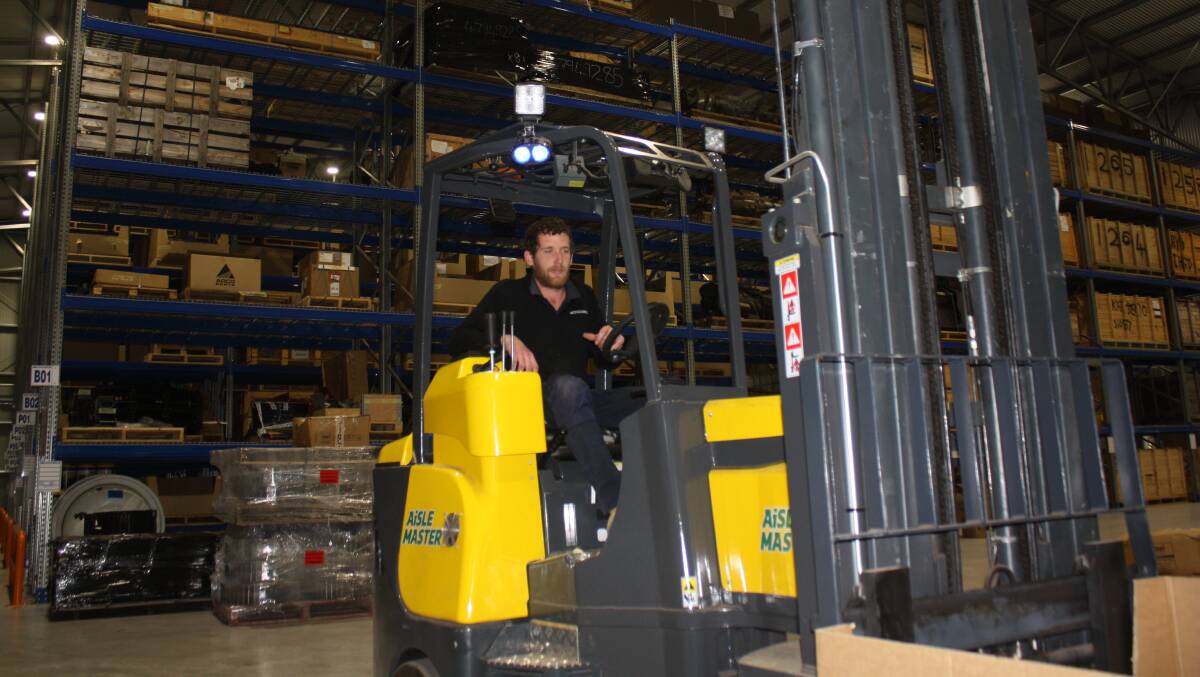 Parts warehouse supervisor Tom Bull is one of many young people working with McIntosh & Son to develop their careers.