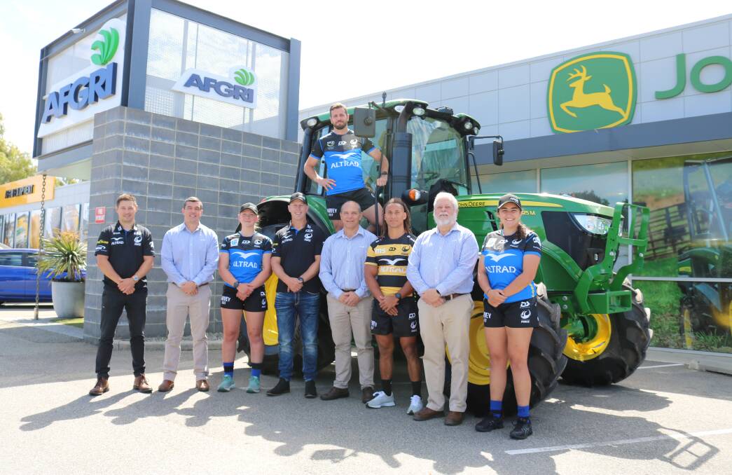 At the AFGRI Equipment head office, South Guildford, last week for the launch of the sponsorship partnership between AFGRI Equipment and the Western Force rugby union team were Western Force business development manager Huw Lock (left), AFGRI Equipment general manager sales and marketing Jacques Coetzee, Western Force womens team prop Chelsea Wulff, head coach Simon Cron and mens team scrum half Ian Prior (back), AFGRI commercial director Wessel Oosthuizen, Western Force scrum half Issak Fines-Leleiwasa, AFGRI operations director Gollie Coetzee and womens team hooker Sofia Bekir Fuente with a John Deere 625M tractor.