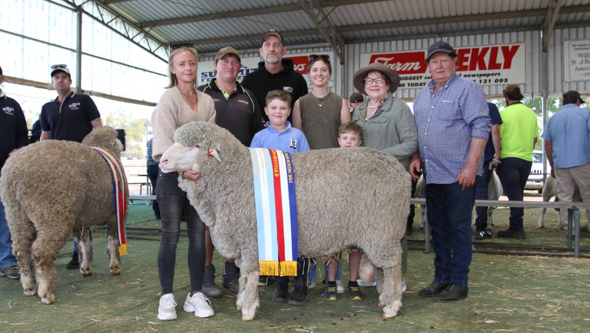  With the reserve grand champion Poll Merino ram and champion fine-medium wool Poll Merino ram exhibited by the Lewis familys Lewisdale stud, Wickepin, were Lewisdale stud connections Rebecca Matthews (left), John Bushby, Ashley Dowey, Jordan Taylor, Brooklyn Matthews, Kai Taylor, Helen and Ray Lewis.