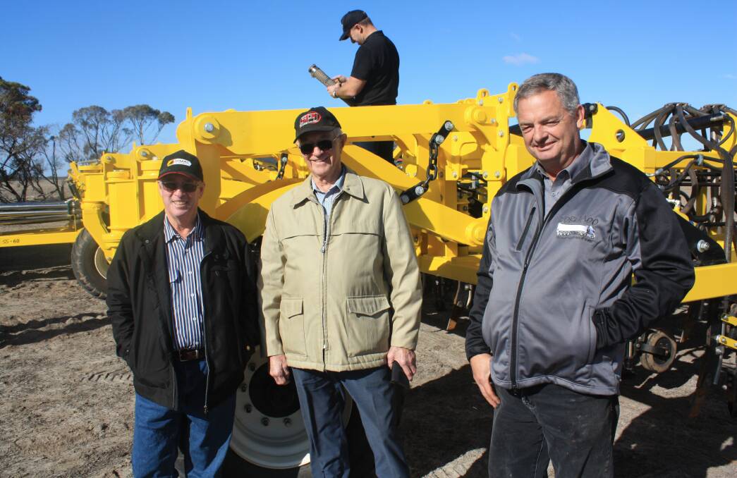 Discussing the features of this 18.2 metre Seed Storm at last week's demonstration were Graham Imberti (left), Gnowangerup, Davis Bloomfield, Kalannie and Duraquip director Garry Richardson.