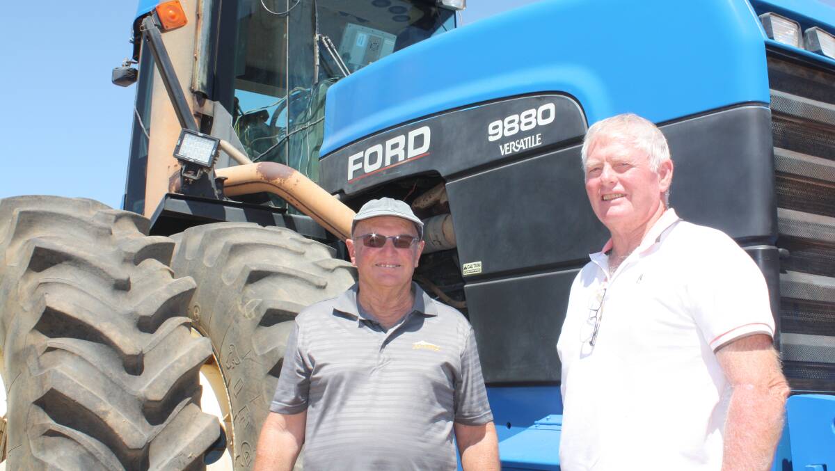Retired farmers Ian Bassula (left) and John Lee decided on a day out from Perth into familiar territory. Ian used to farm in the Westonia district while John used to live at Walgoolan before establishing a cattle stud at Wandering. The Ford Versatile 9880 (7993 hours) on triples later sold for $50,000. 