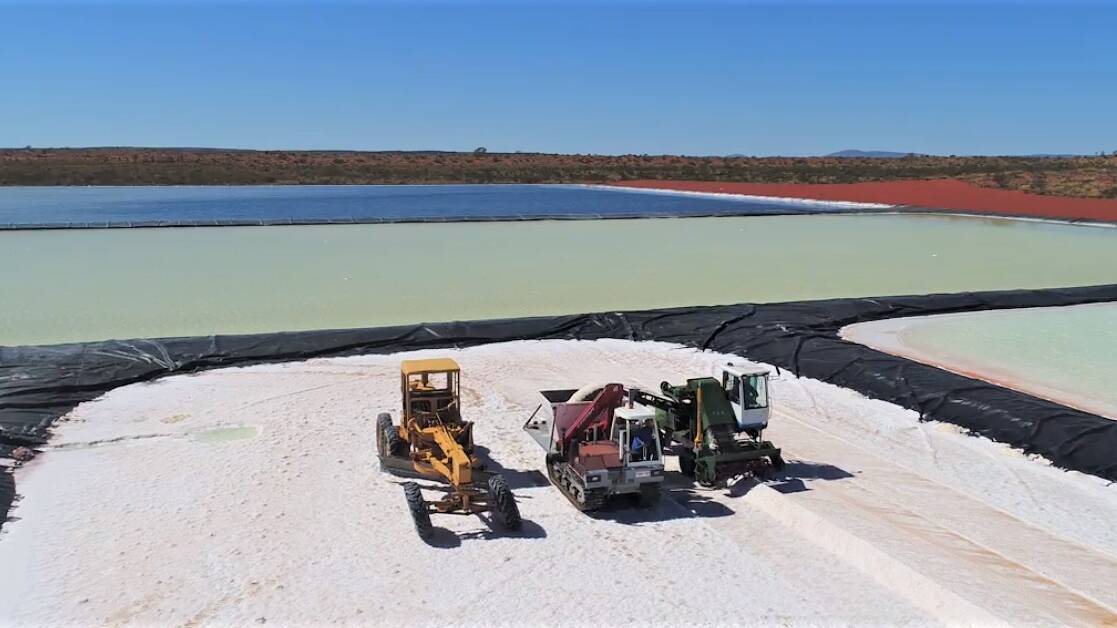 Kalium Lakes' Beyondie Sulphate of Potash (SoP) project in the Little Sandy Desert has been granted major project status by the Federal government. Pictured are a grader, tracked bin and harvester testing the process for harvesting salts from pilot-scale evaporation ponds for processing into SoP.