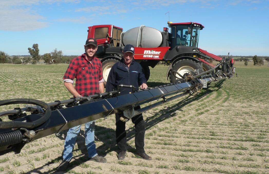  Reece Stratford (left) with McIntosh & Son Wongan, Hills sales manager David Trindall and the family's Miller Nitro 7380 sprayer at the family's Minnivale property between Dowerin and Wyalkatchem. Mr Stratford says the front-mounted booms were ideal for spraying into the corners of paddocks and monitoring the boom at all times for any blocked nozzles.