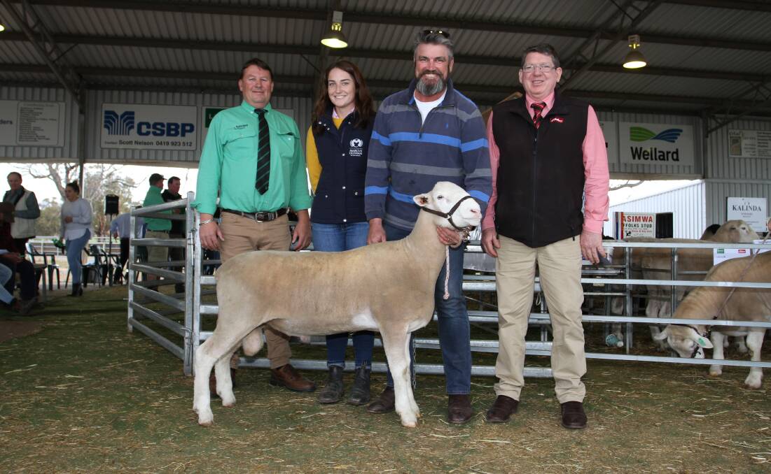 Nutrien Livestock Breeding representative Roy Addis (left), Shelby and Collyn Garnett, Curlew Creek Poll Dorset stud, Gnowangerup and Elders prime lamb specialist Michael O'Neill with the Curlew Creek ram that sold for the breed's $3500 top price to Jeff Pyle & Co, Albany.