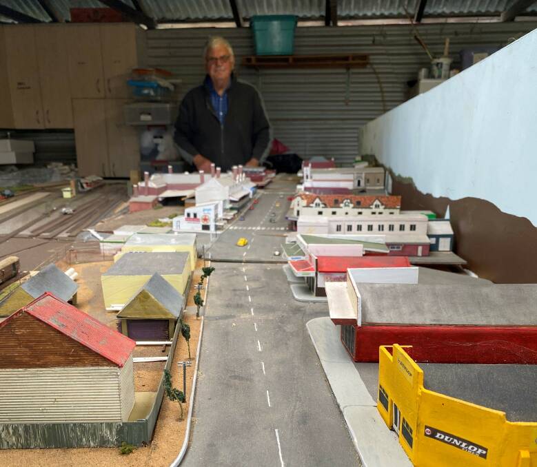 Morrie Russell, working on the final touches of the miniature project.