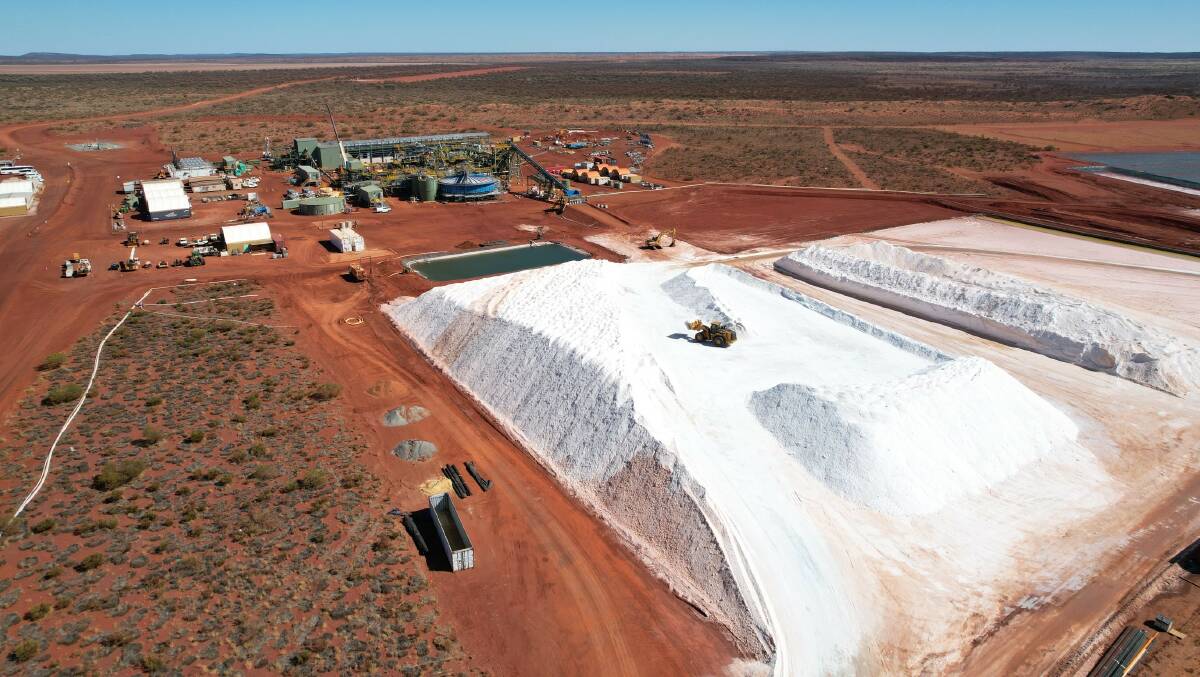 Kalium Lakes Ltd has stockpiled 90,000 tonnes of harvest salts, foreground, from its evaporation ponds system at its Beyondie project in the Little Sandy Desert, ready to begin commercial processing into Sulphate of Potash fertiliser either next month or October.