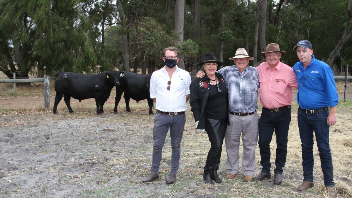 The $16,000 second top price at the Little Meadows sale was paid by Fernwood Farms Angus stud, Gingin, for Little Meadows Qualeu Q35 (by Prime Nirvava N33). With the bull were sale auctioneer Miles Pfitzner (left), Glasser Total Sales Management, buyers Dale and John Jansen, Fernwood Farms stud, Deane Allen, Elders Donnybrook and stud stock and Allen Bentham, Delaney Livestock Services.
