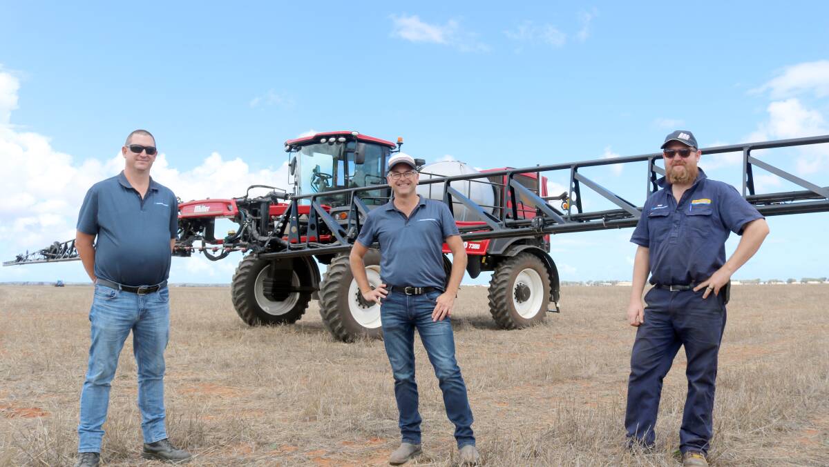 Malcolm Bear (left), McIntosh & Son Geraldton parts manager, Mike Symes, Miller Sales for WA, McIntosh Distribution and Ben Davies, McIntosh & Son Geraldton service technician, in front of the Miller Nitro 7000 series boomsprayer.