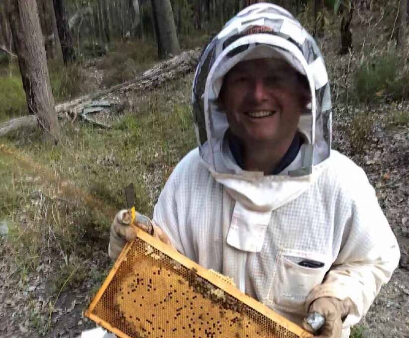  WAFarmers Bee Section president Matt Colvin with some of his hives.