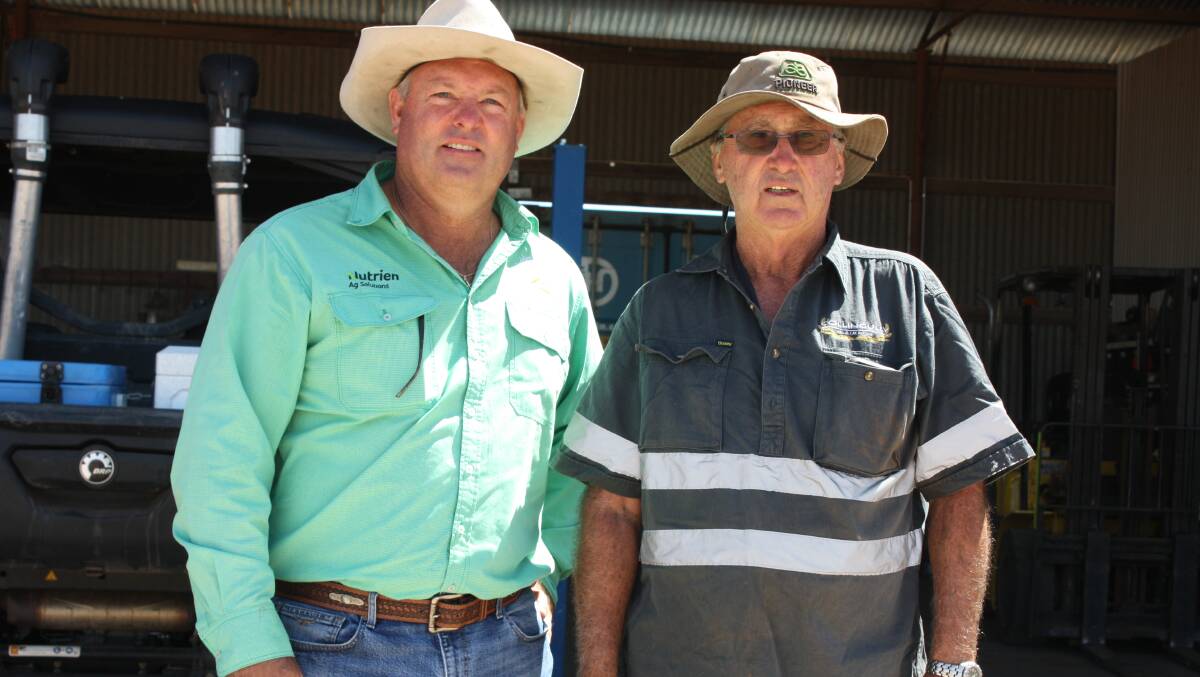 Auctioneer Chris Waddingham (left), with vendor Mervyn Burges before the clearing sale.