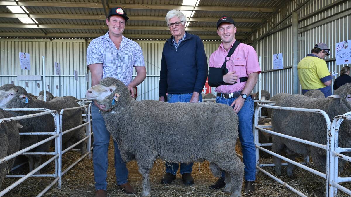 Mianelup stud principal Elliot Richardson (left), with buyer Gaden Rose, Mardo Well Poll Merino stud, Dandaragan, who purchased the bright, white woolled Poll in lot 25 for $4300. With them is Elders Gnowangerup representative James Culleton.