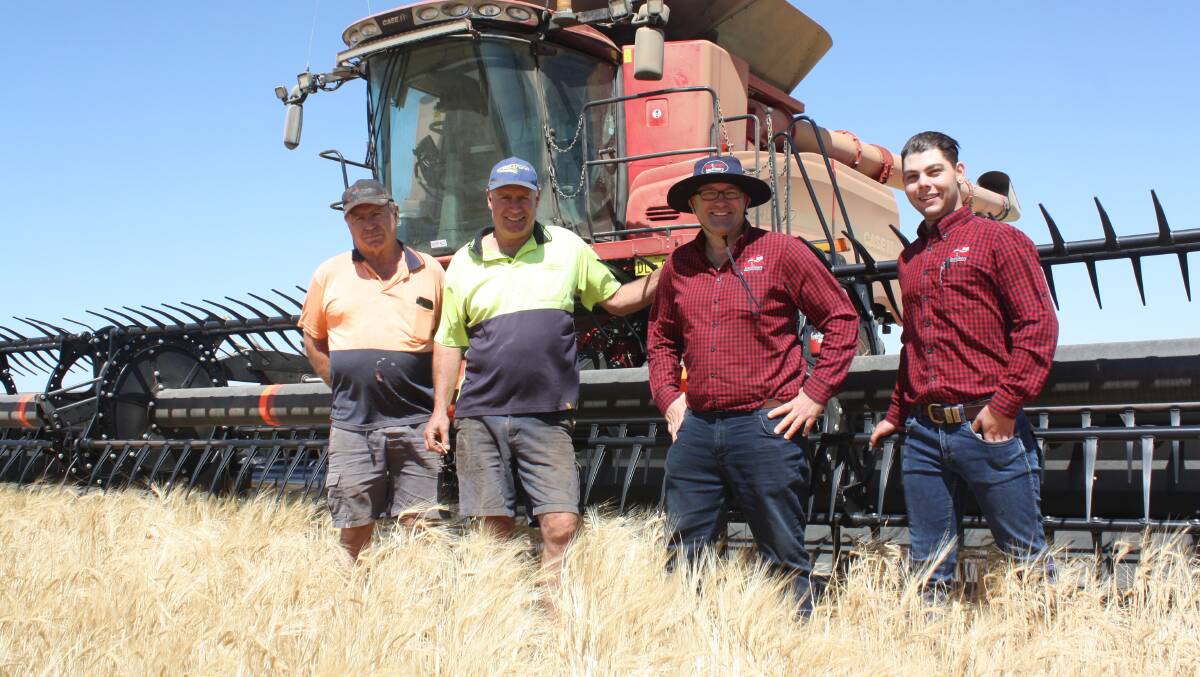 Brothers Allan Dodd (left) and Vic Dodd, Kalannie, in the paddock with Boekeman Machinery, Dalwallinu branch manager Tim Boekeman and company salesman Lyndon Zetovic. The Dodds took a short break from harvesting duties to discuss the performance of their Case IH 8240 header fitted with a Cropscan monitor and Seed Terminator, installed by Boekeman Machinery.