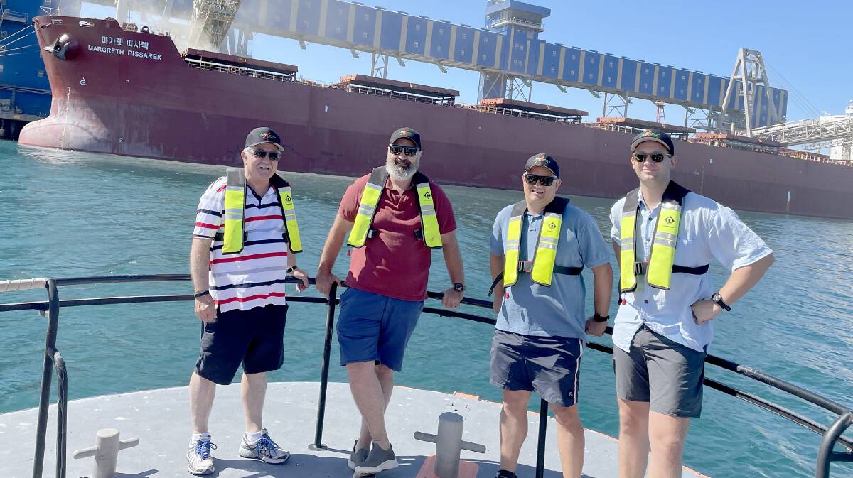 The AAAX team watching a ship being loaded at the CBH Kwinana Grain Terminal.