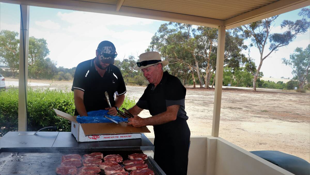 Bevan Clarke (left) and Neville Clarke cooked the barbecue steaks on the first night of the event.